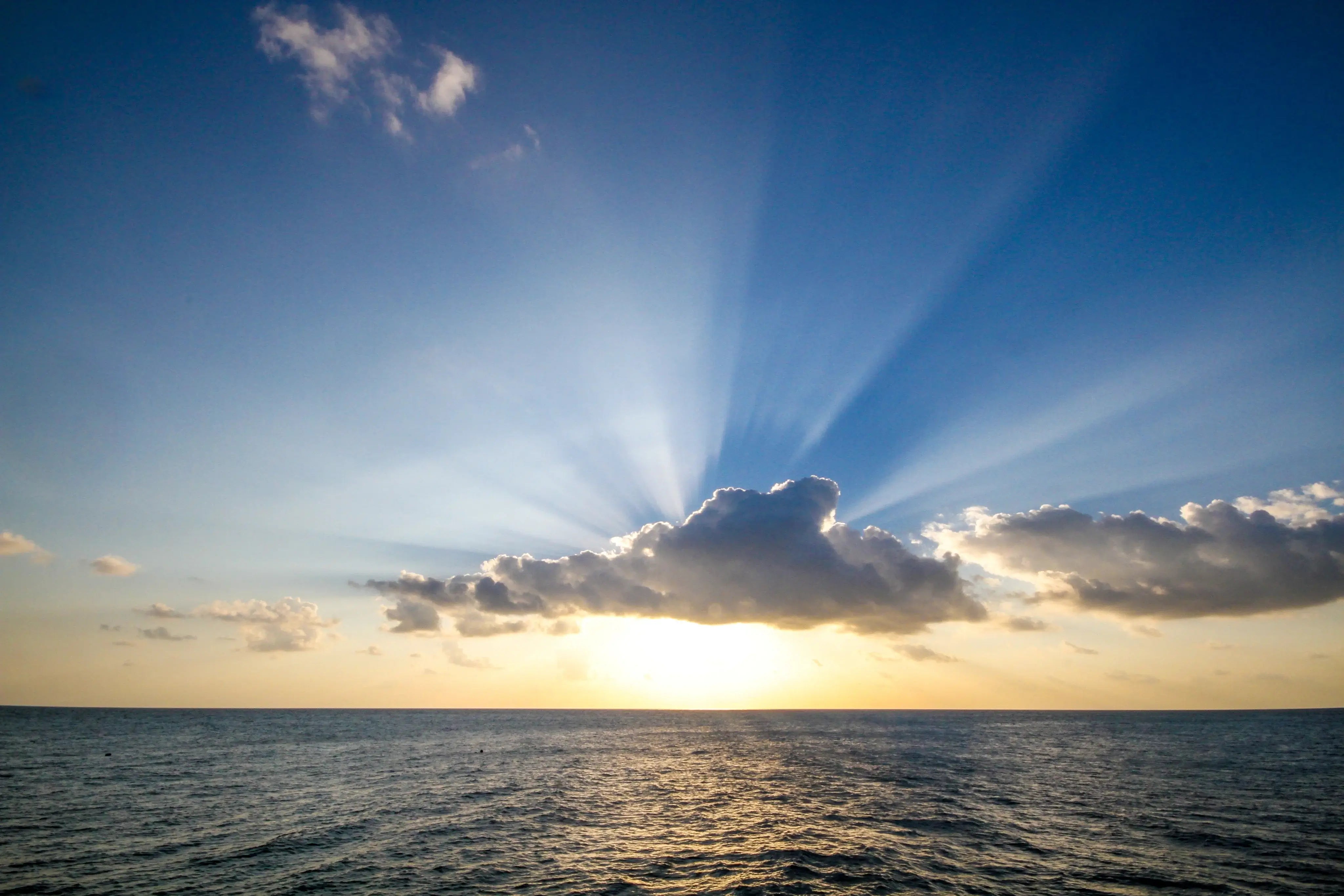 sun-setting-over-ocean_1.webp
