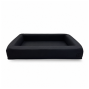 A black rectangular bolster set for a modular dog bed, shown from a front angle on a clean white background.