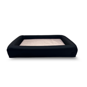 Ecru waterproof dog bed with black bolster and removable washable covers.