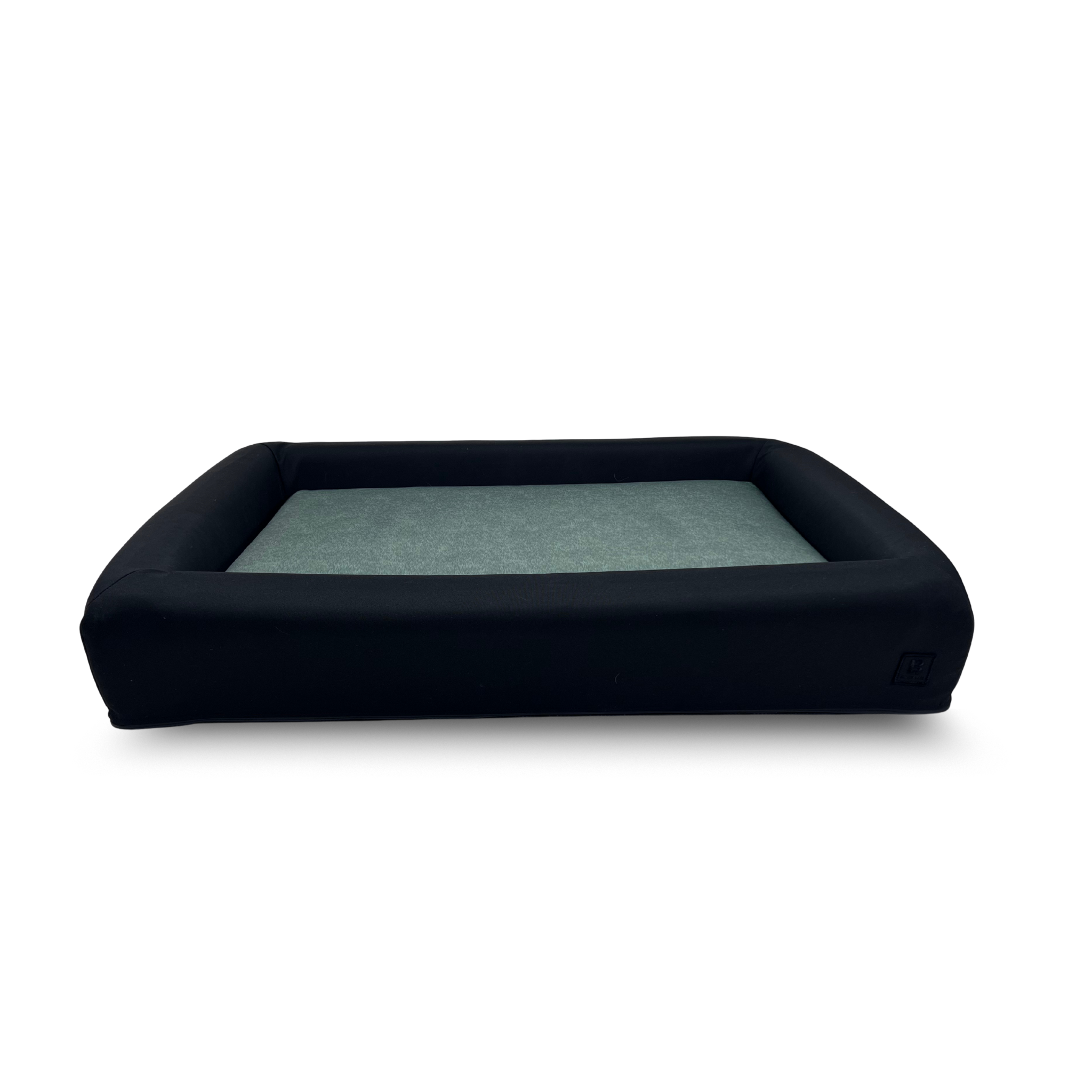 Sage waterproof dog bed with black bolster and removable washable covers.