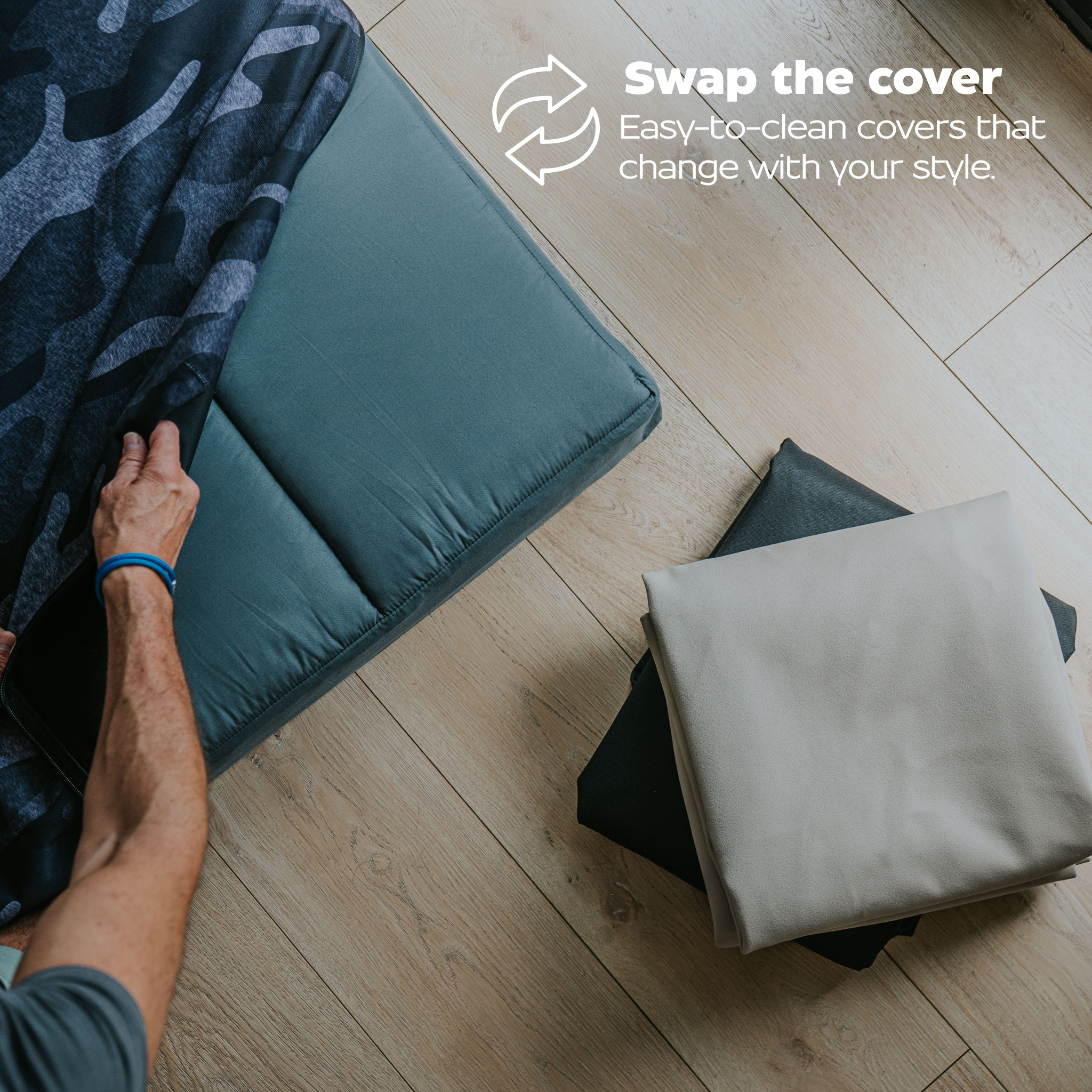 Person swapping a dog bed cover with text about easy-to-clean covers.